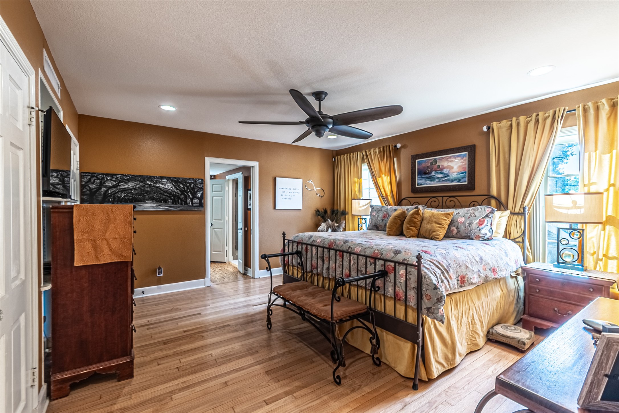 706 Church Street Navasota, TX 77868 - Photo 33 of 50 a bedroom with a bed and wooden floor