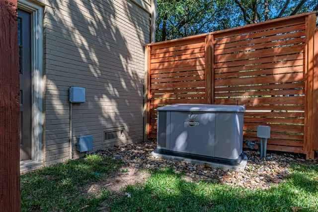 a view of a house with backyard porch and sitting area