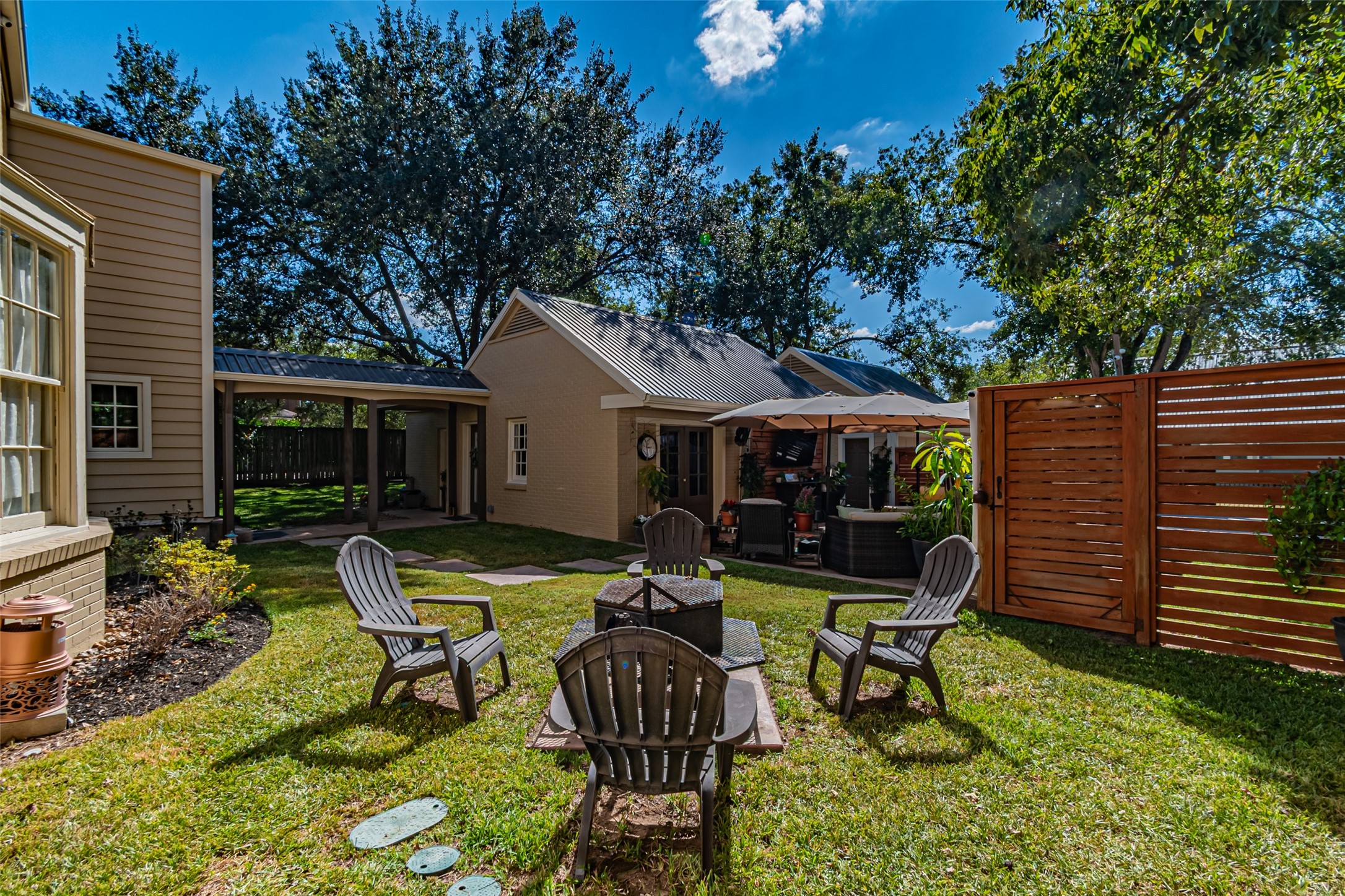 706 Church Street Navasota, TX 77868 - Photo 43 of 50 a view of a house with backyard porch and sitting area