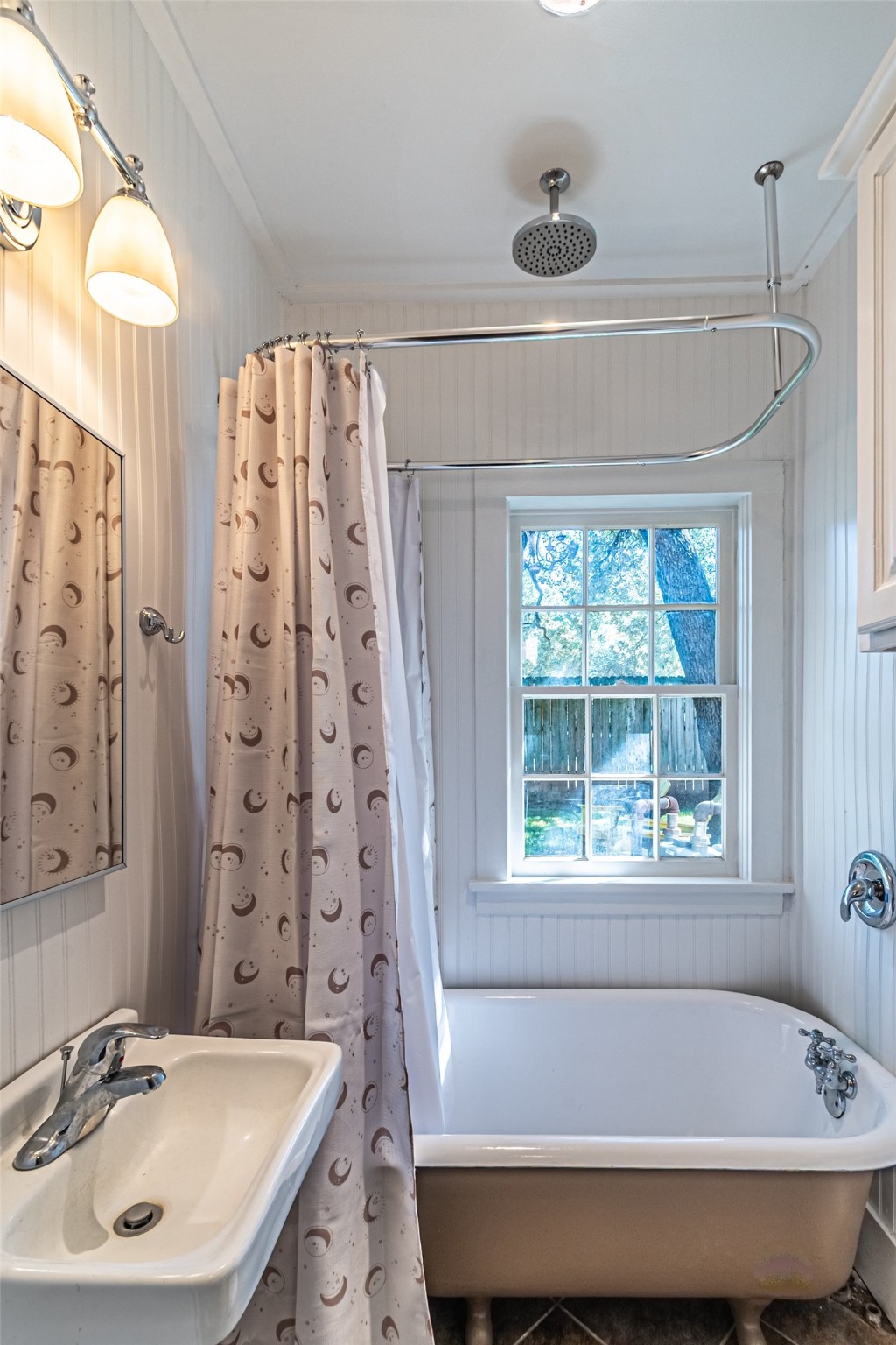 706 Church Street Navasota, TX 77868 - Photo 50 of 50 a bathroom with a sink and a bathtub