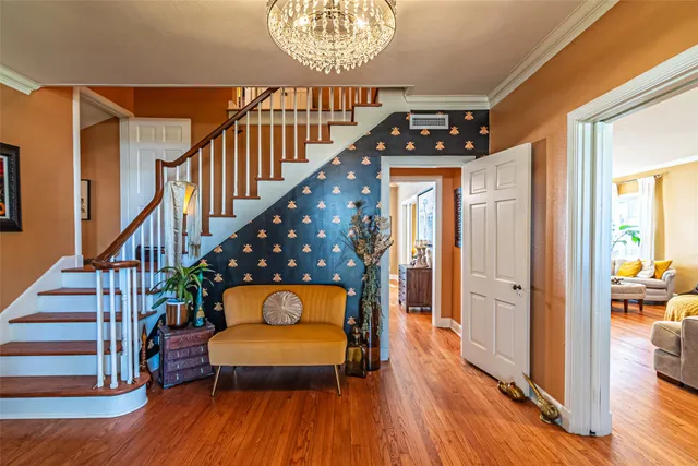 a view of a entryway door with hallway
