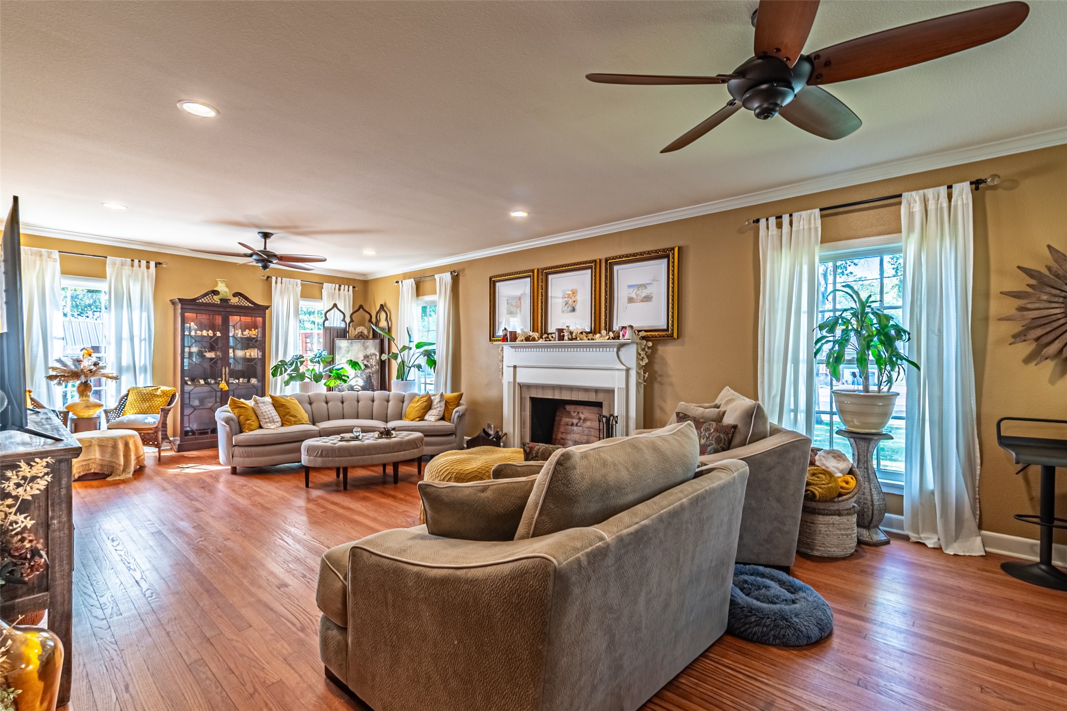 706 Church Street Navasota, TX 77868 - Photo 7 of 50 a living room with furniture fireplace and a large window