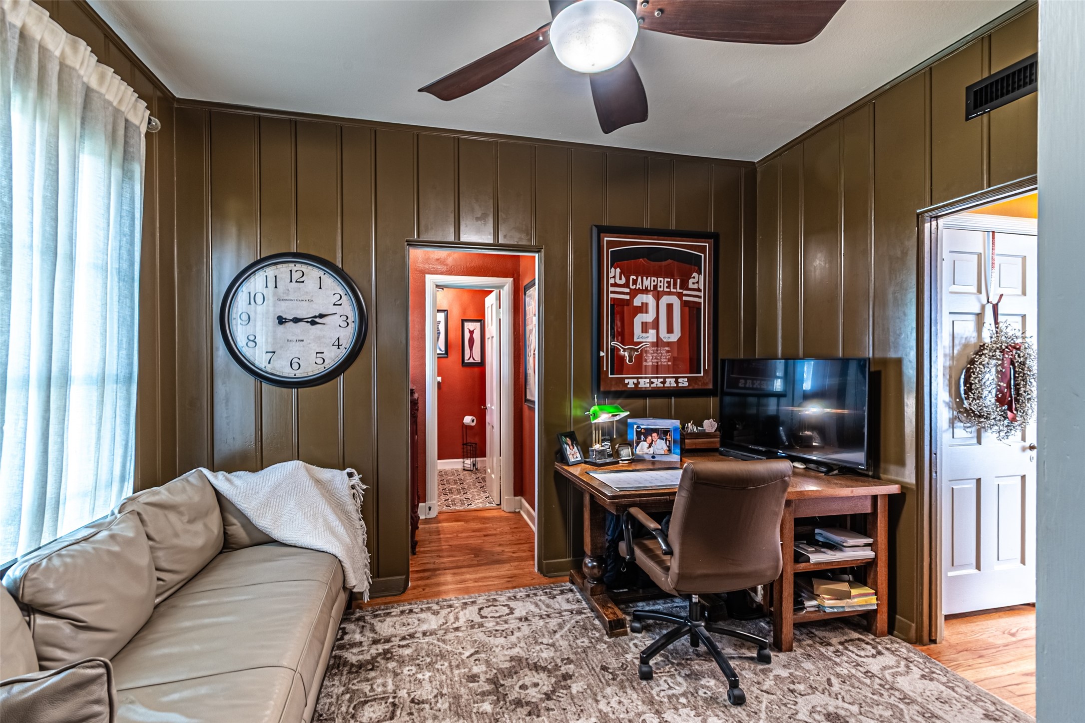 706 Church Street Navasota, TX 77868 - Photo 10 of 50 a living room with furniture a clock and a window