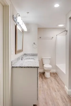 a view of a walk in closet and window