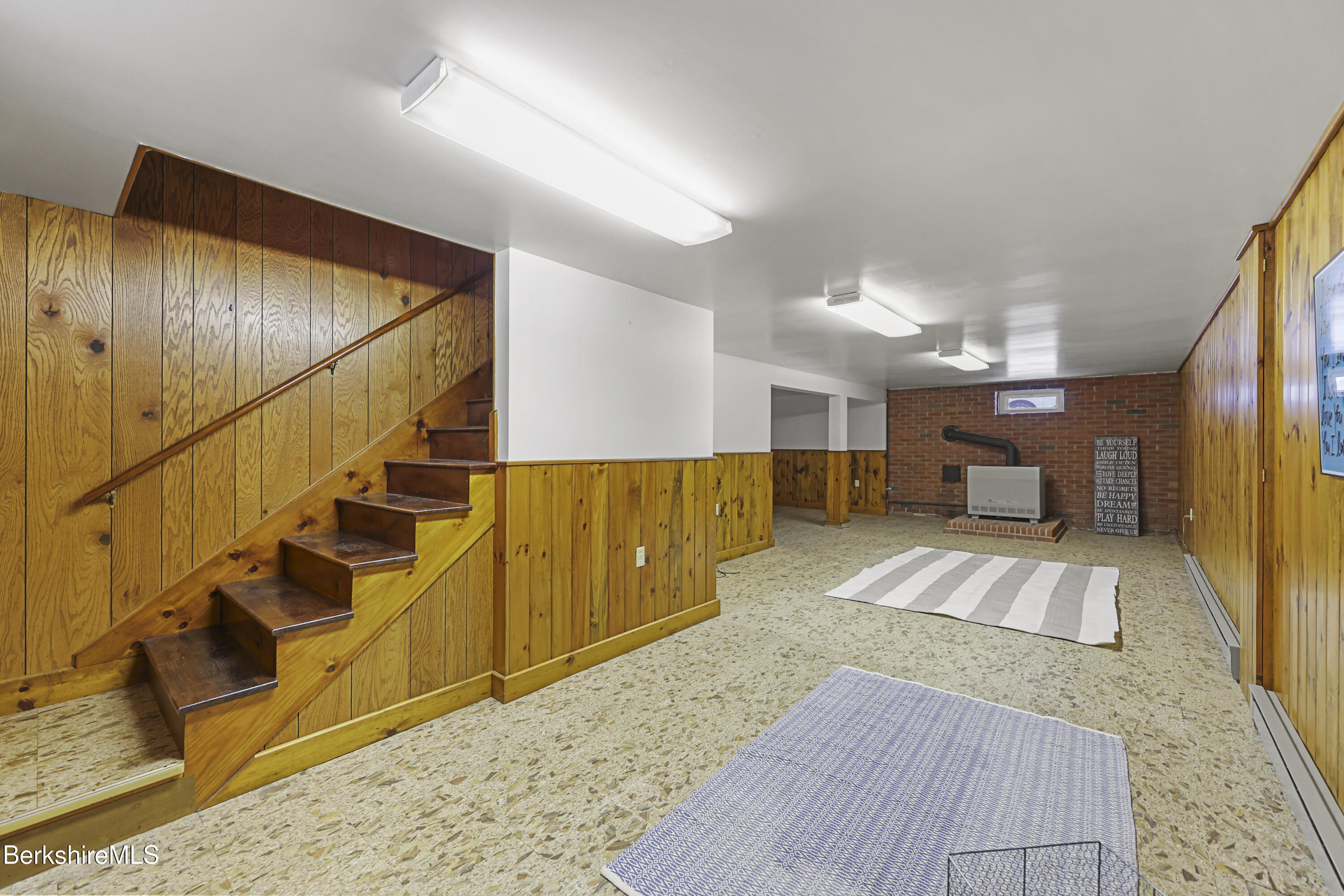 46 Lucille Street Pittsfield, MA 01201 - Photo 34 of 47 a view of a hallway with wooden floor and staircase