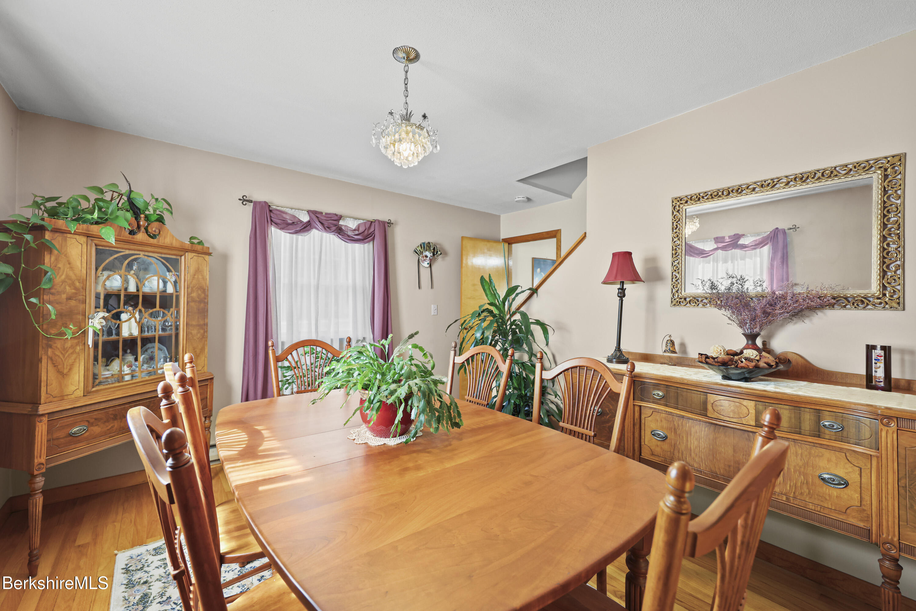 46 Lucille Street Pittsfield, MA 01201 - Photo 9 of 33 a view of a dining room with furniture and chandelier