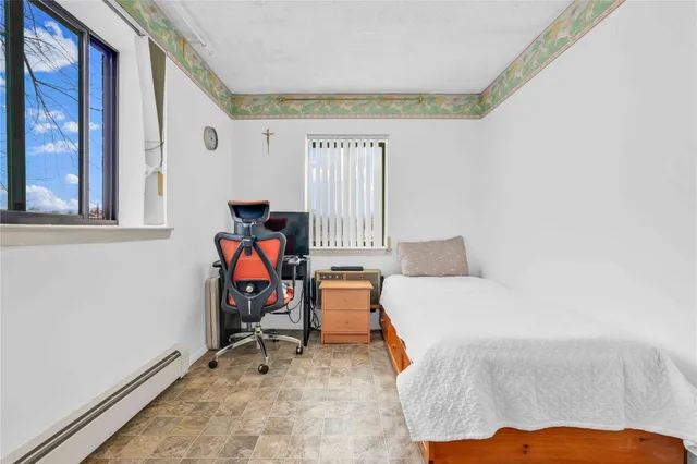 a view of room with furniture and windows