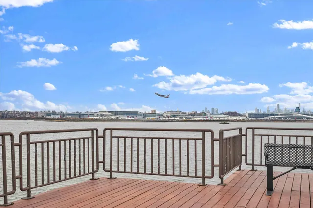 a view of balcony with wooden floor