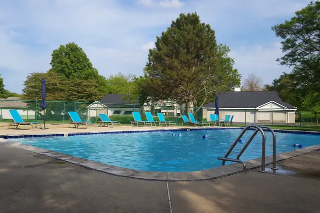 a view of a house with basketball court