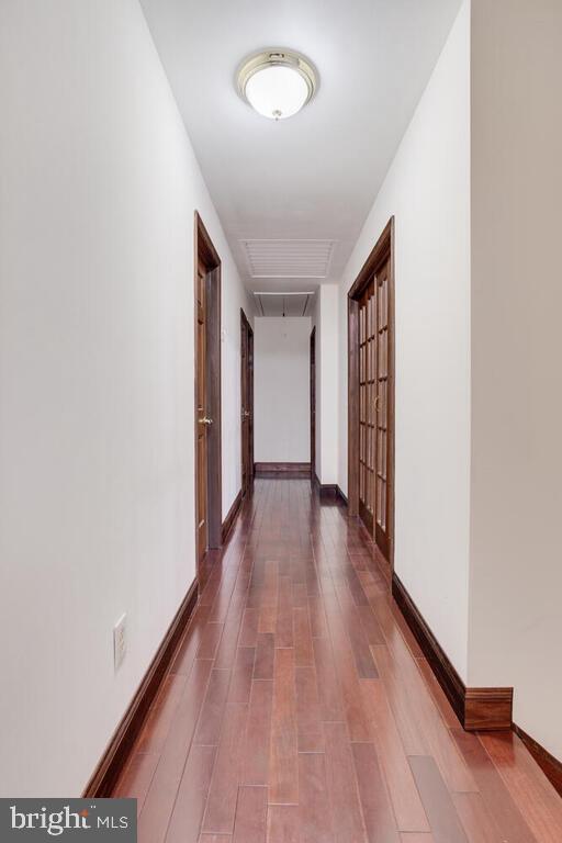 936 Grace Road Huntingtown, MD 20639 - Photo 42 of 64 a view of a hallway with wooden floor