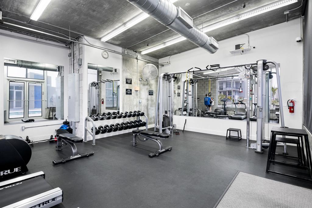 425 North Andrews Avenue, Unit 206 Fort Lauderdale, FL 33301 - Photo 17 of 17 a living room with patio furniture and a chandelier