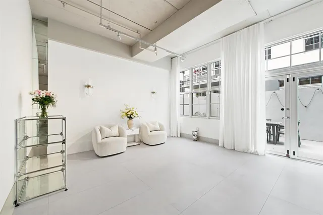 a view of a room with table and chair