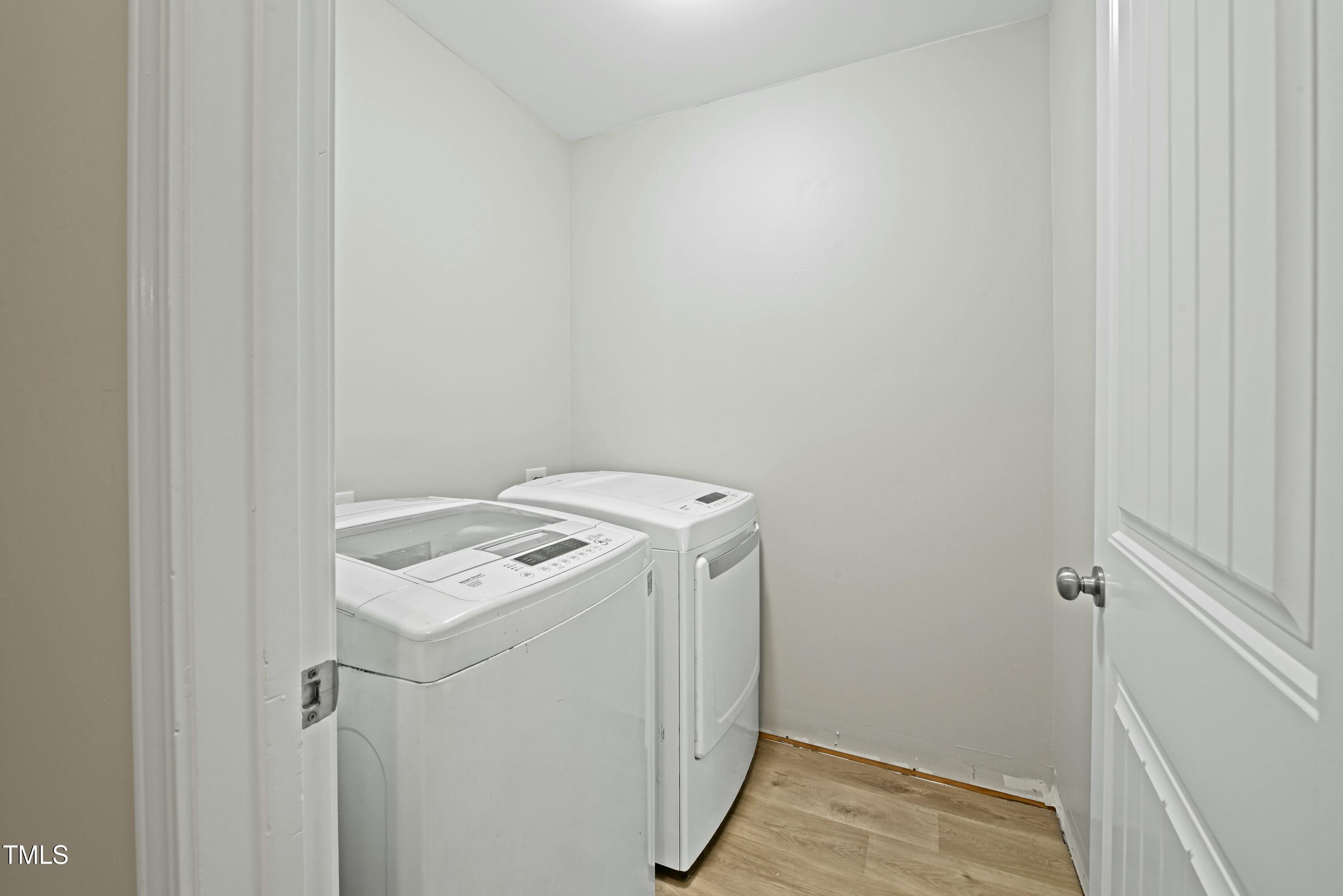 64 Valor Circle Bunnlevel, NC 28323 - Photo 28 of 34 a utility room with dryer and washer