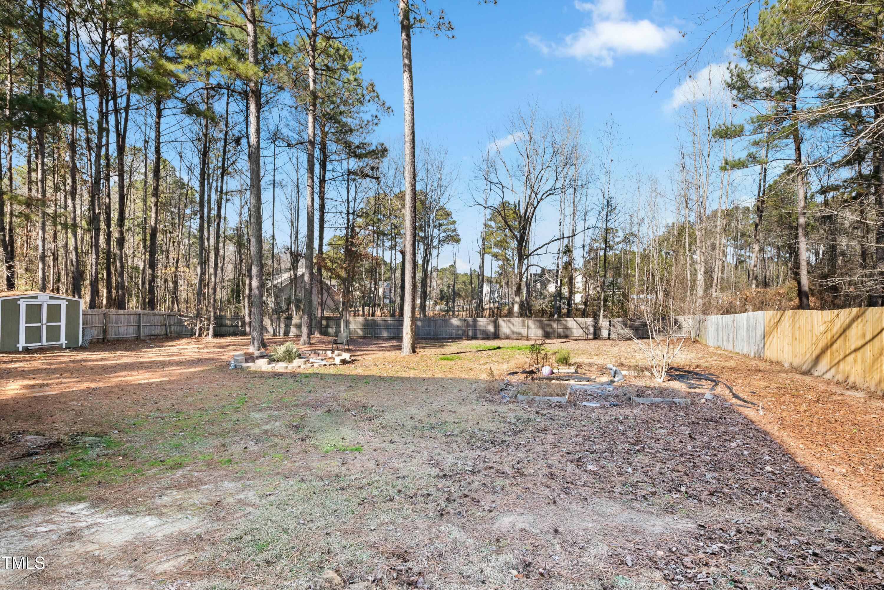 64 Valor Circle Bunnlevel, NC 28323 - Photo 29 of 34 a view of a swimming pool with a patio