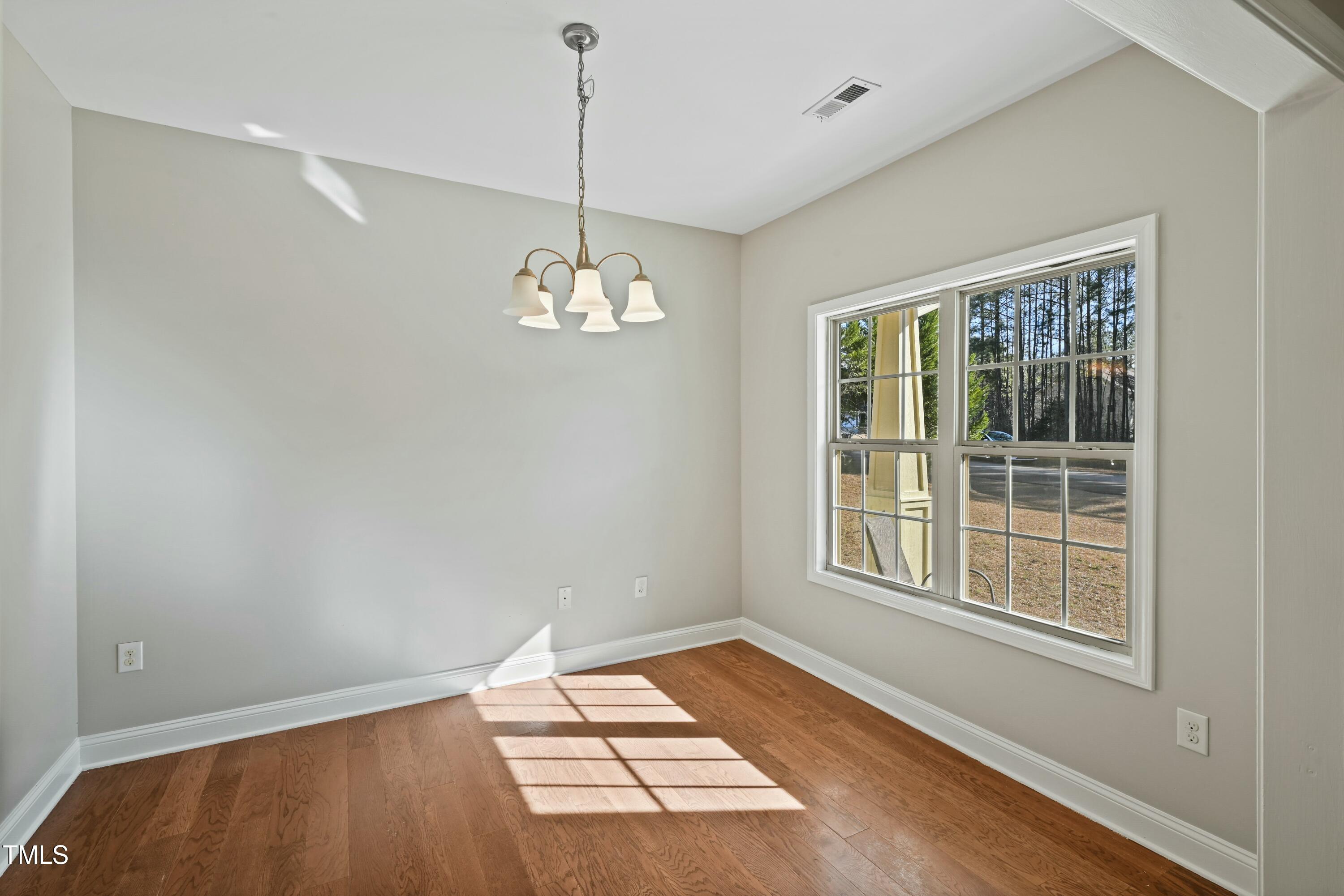 64 Valor Circle Bunnlevel, NC 28323 - Photo 5 of 34 a view of an empty room with a window