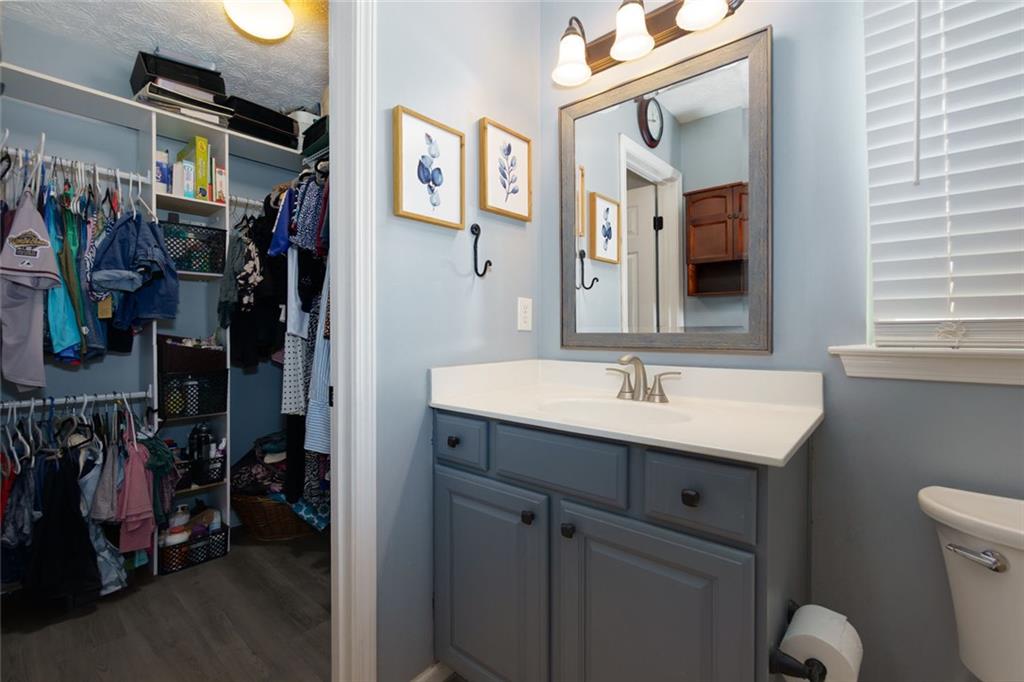 67 Granite Court Dallas, GA 30132 - Photo 15 of 27 a bathroom with a sink and a mirror