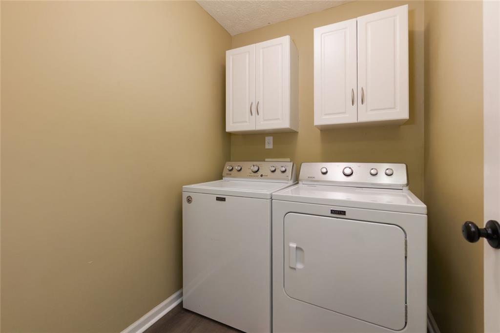 67 Granite Court Dallas, GA 30132 - Photo 20 of 27 a utility room with dryer and washer