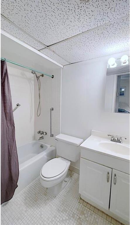 1200 Colonnades Drive, Unit 208 Fort Pierce, FL 34949 - Photo 24 of 31 a bathroom with a sink a toilet and shower
