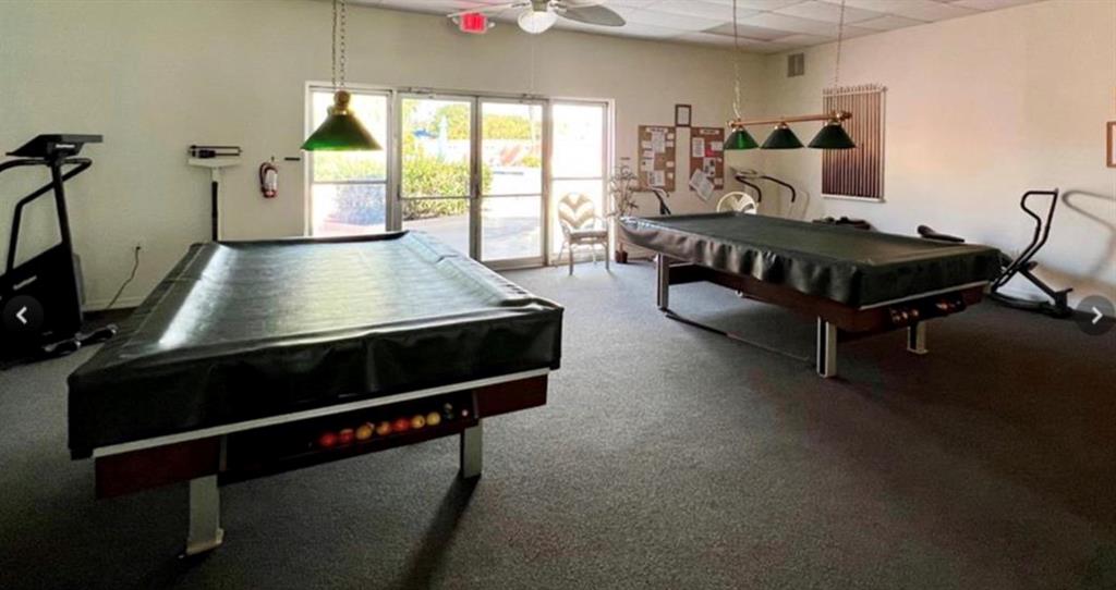 1200 Colonnades Drive, Unit 208 Fort Pierce, FL 34949 - Photo 28 of 31 a room with furniture and windows