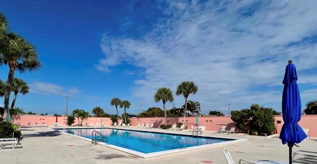 1200 Colonnades Drive, Unit 208 Fort Pierce, FL 34949 - Photo 3 of 31 view of a outdoor space with seating area