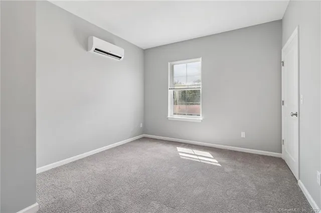 a view of empty room with windows