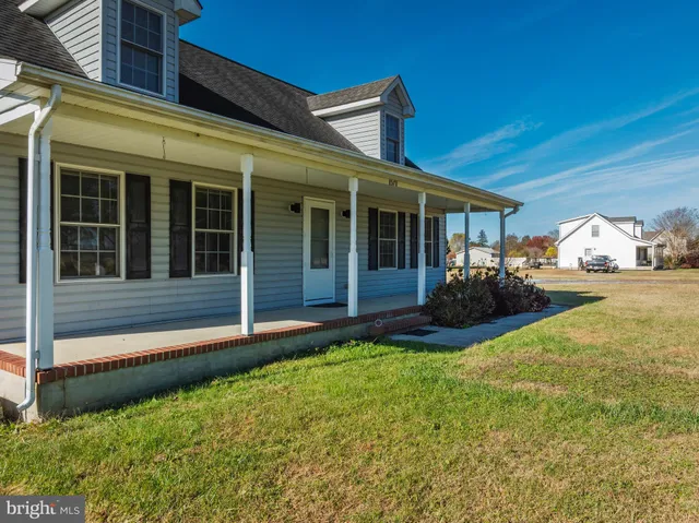 a view of a house with a garden