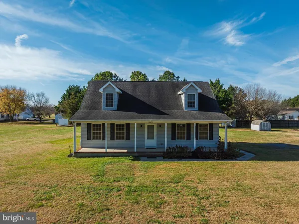 a view of a house with a swimming pool