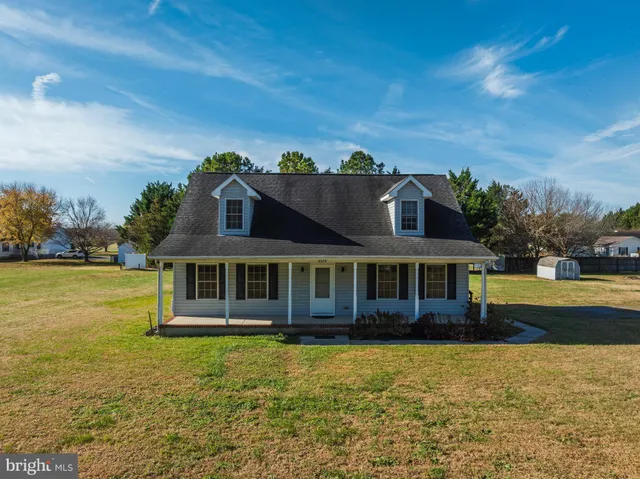 a view of a house with a swimming pool