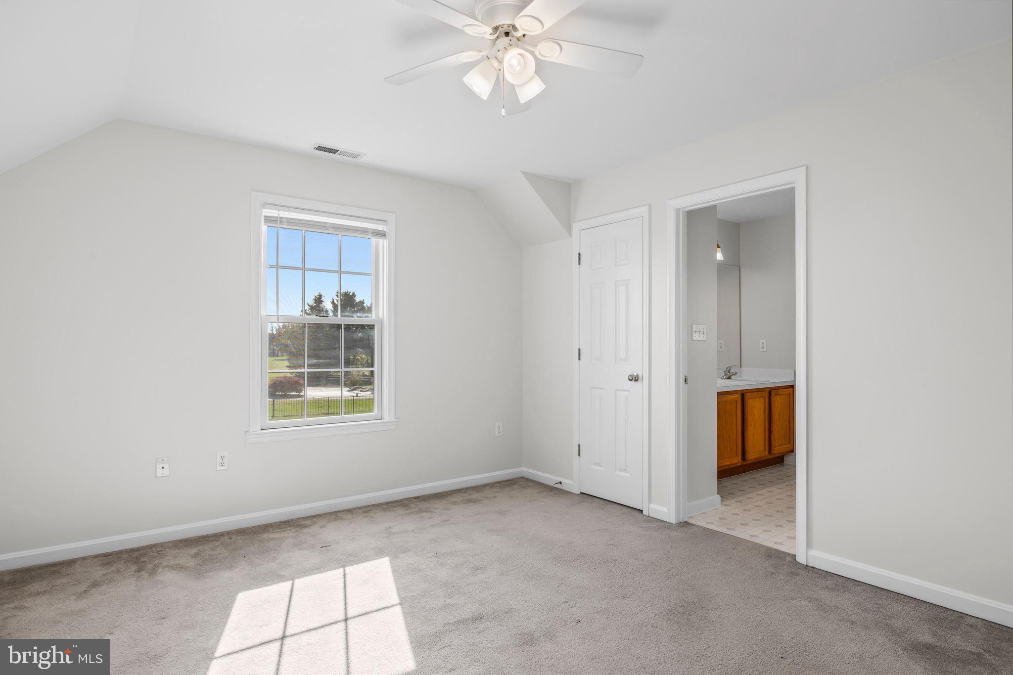 8578 Tuckahoe Road Denton, MD 21629 - Photo 41 of 64 an empty room with windows and closet