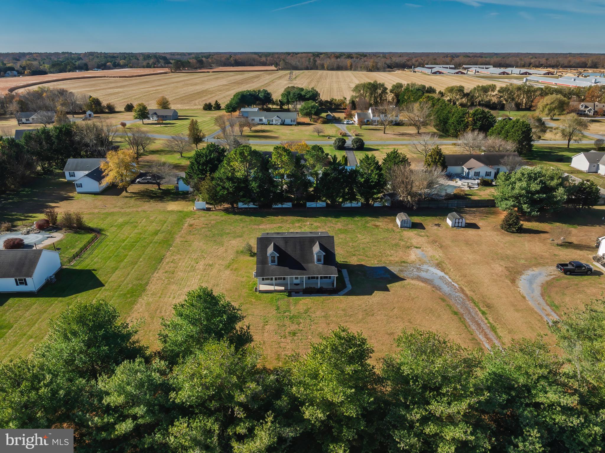 8578 Tuckahoe Road Denton, MD 21629 - Photo 52 of 64 an aerial view of a house with yard swimming pool and outdoor seating