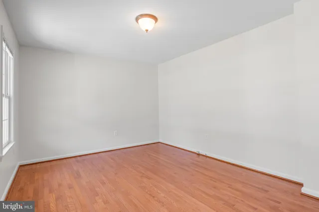a view of staircase with wooden floor and stairs
