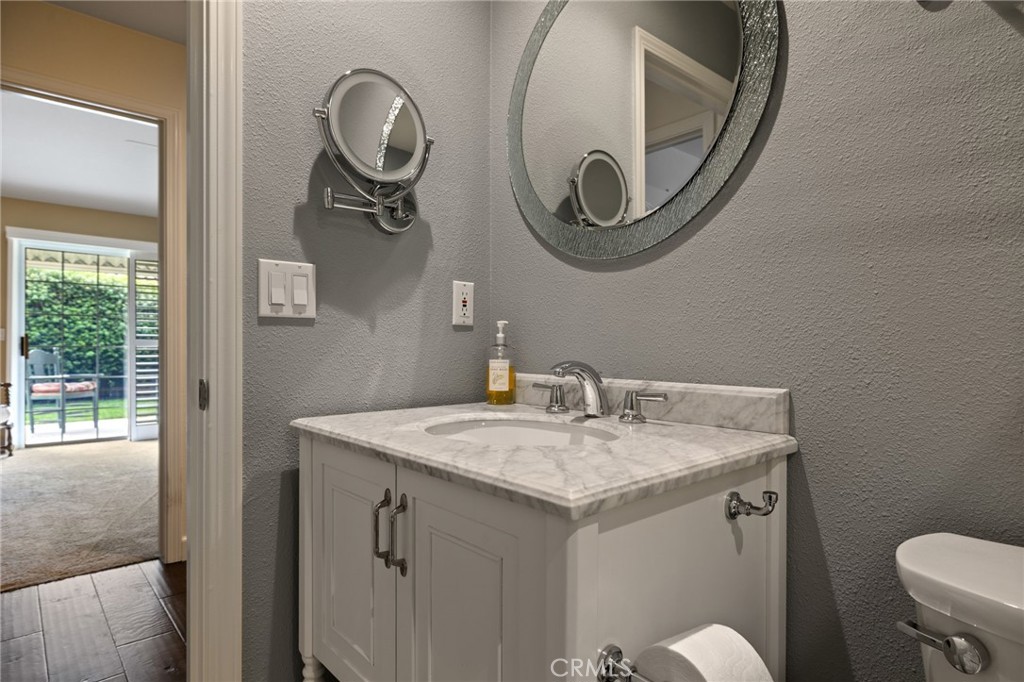 554 Andrea Circle Paso Robles, CA 93446 - Photo 13 of 34 a bathroom with a toilet and a sink