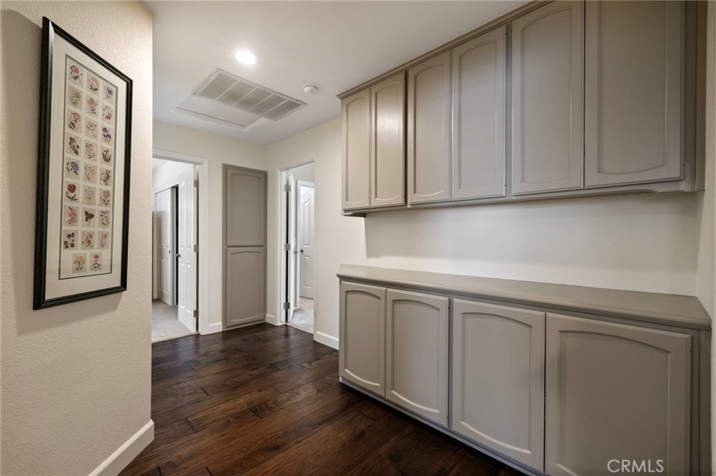554 Andrea Circle Paso Robles, CA 93446 - Photo 18 of 34 a kitchen with cabinets and wooden floor