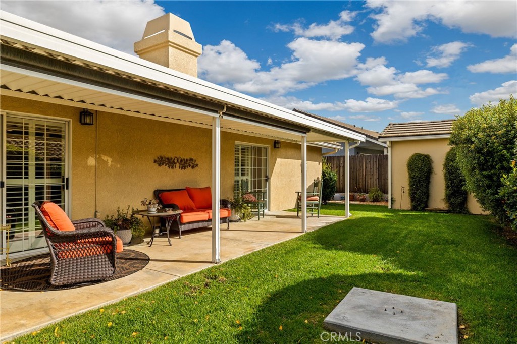 554 Andrea Circle Paso Robles, CA 93446 - Photo 24 of 34 a view of a house with backyard porch and sitting area
