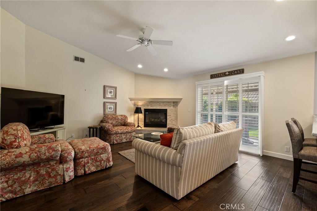 554 Andrea Circle Paso Robles, CA 93446 - Photo 7 of 34 a living room with furniture and a flat screen tv