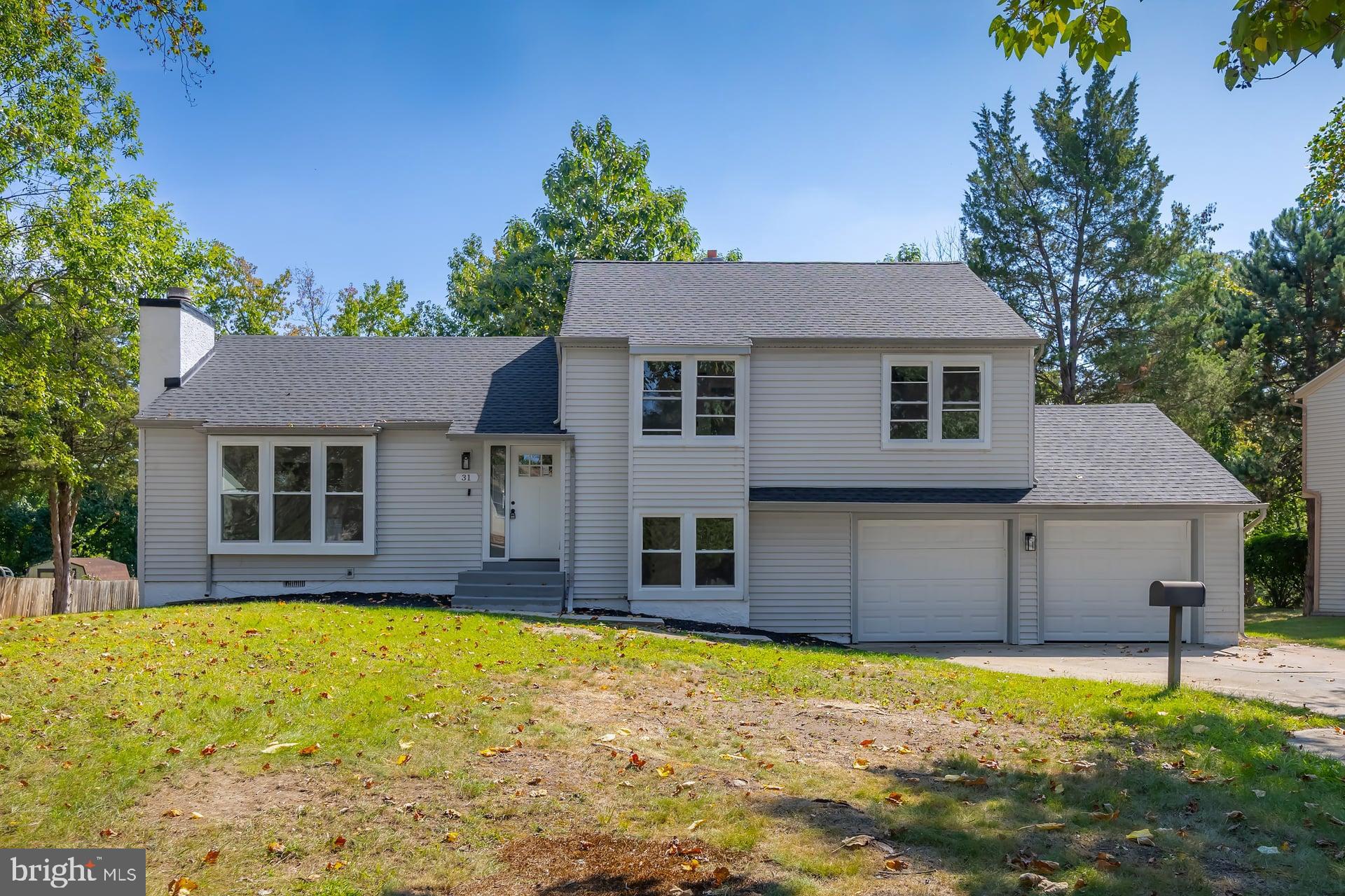 31 Quince Court Mount Laurel, NJ 08054 - Photo 1 of 21 a front view of a house with a yard