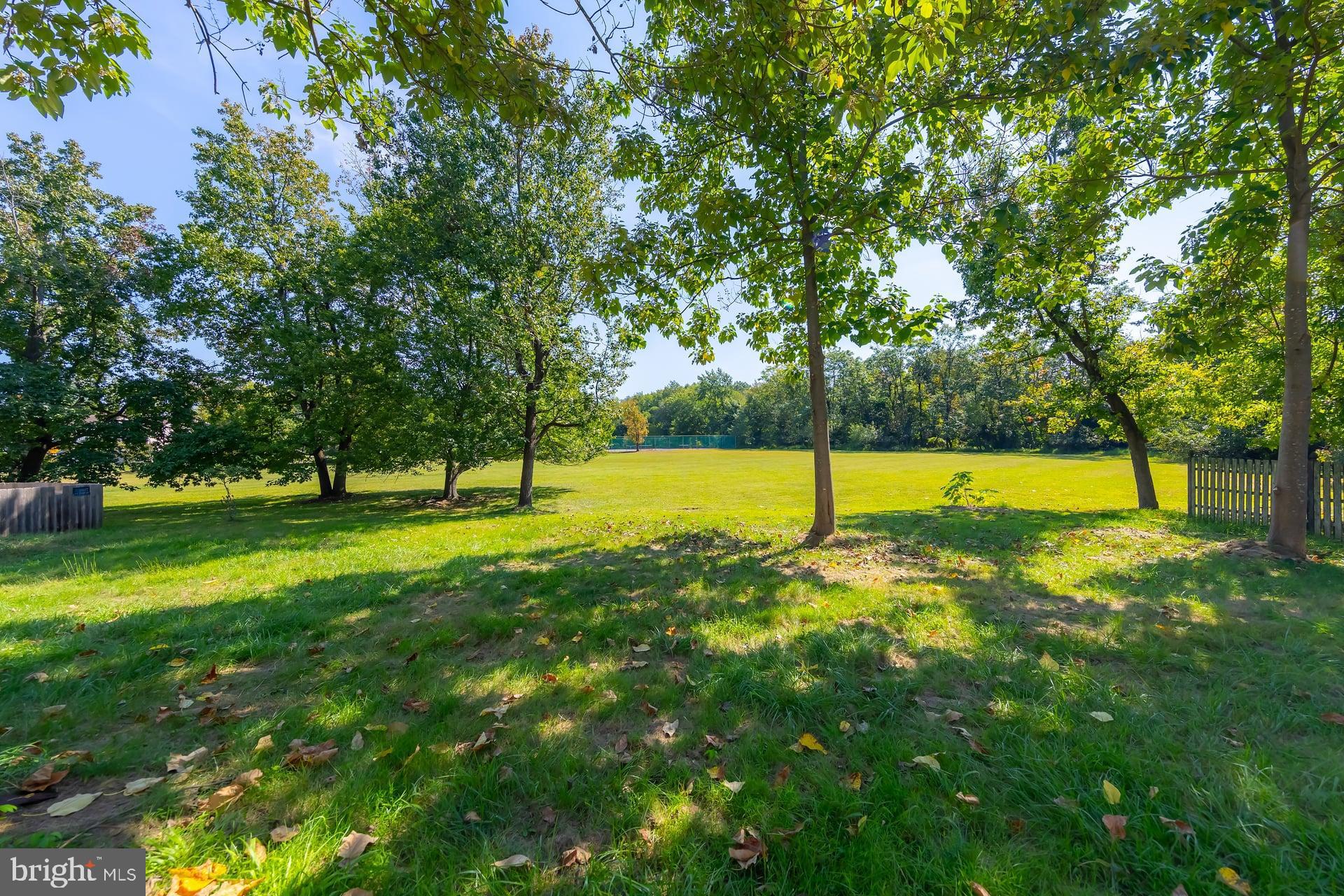 31 Quince Court Mount Laurel, NJ 08054 - Photo 21 of 21 a view of yard with swimming pool and trees