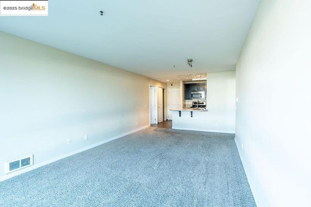 a view of a livingroom and a window