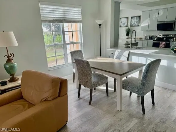a view of a dining room with furniture