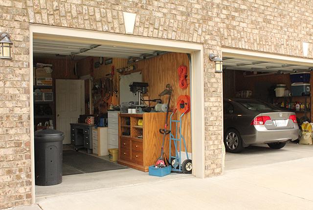 5340 Sherrington Road Murfreesboro, TN 37128 - Photo 20 of 20 Three car garage with the first bay used as a workshop with a dividing wall with additional access through an interior man door.