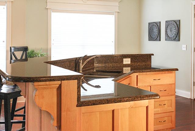 5340 Sherrington Road Murfreesboro, TN 37128 - Photo 4 of 20 Granite countertops, upgraded brushed nickel faucet and under-mount sink.