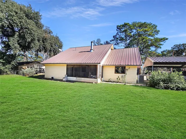 a view of a yard with a trees