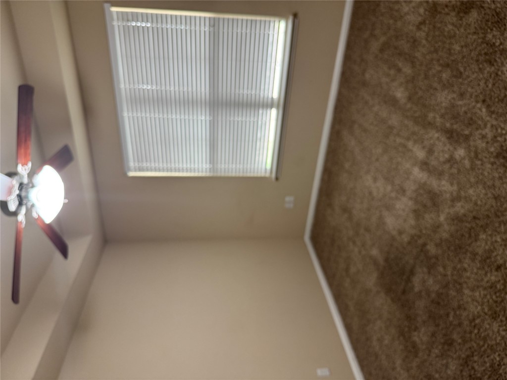7220 Wyoming Springs Drive, Unit 1301 Round Rock, TX 78681 - Photo 12 of 21 an empty room with a window