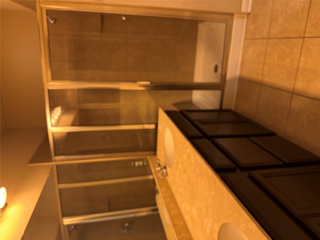 7220 Wyoming Springs Drive, Unit 1301 Round Rock, TX 78681 - Photo 15 of 21 a bathroom with a double vanity sink and shower