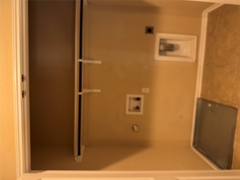 7220 Wyoming Springs Drive, Unit 1301 Round Rock, TX 78681 - Photo 17 of 21 a view of a garage