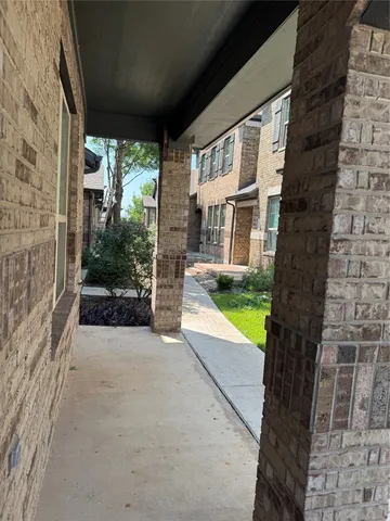 a view of swimming pool with a patio