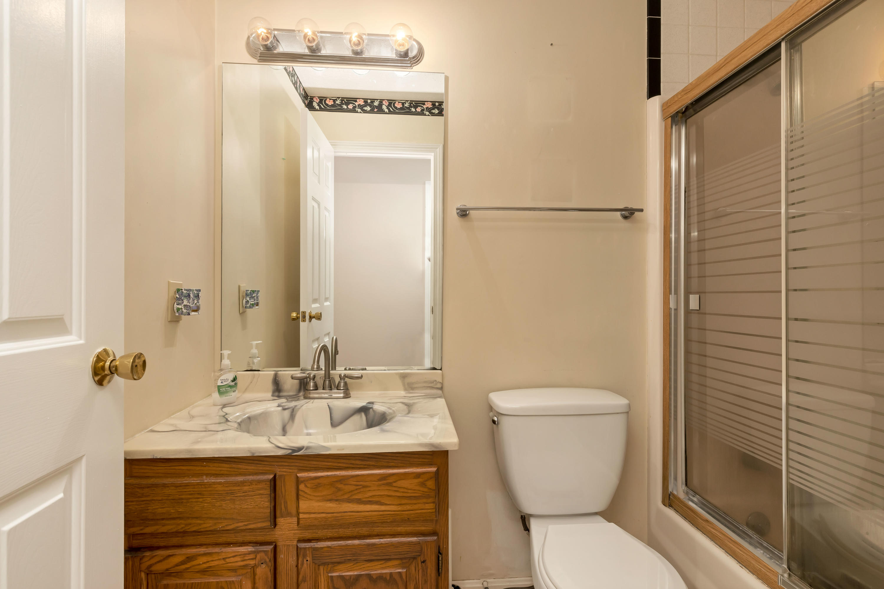 9 Green Pond Road East Falmouth, MA 02536 - Photo 13 of 46 a bathroom with a toilet sink and mirror