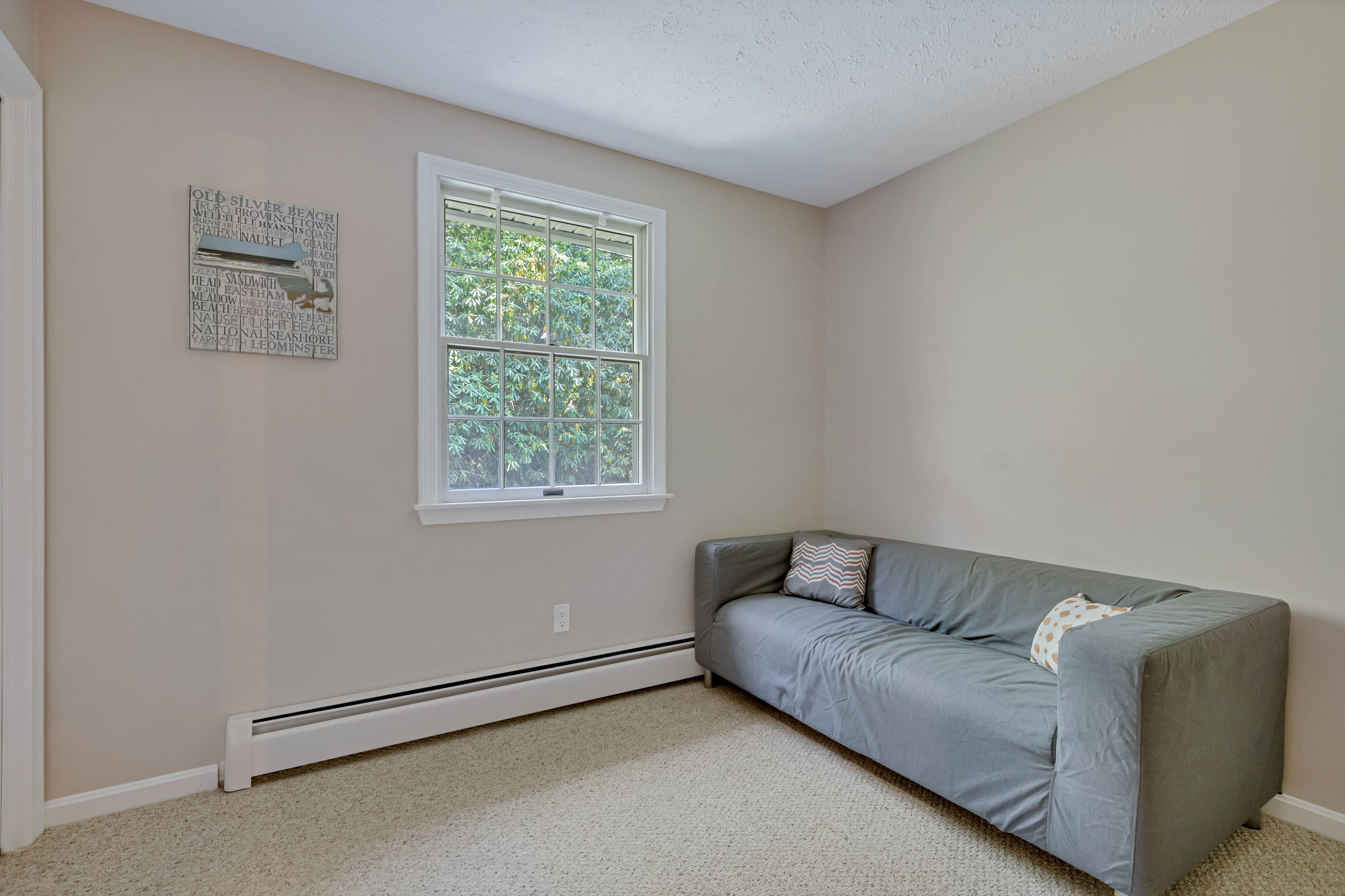 9 Green Pond Road East Falmouth, MA 02536 - Photo 14 of 46 a living room with furniture and a window