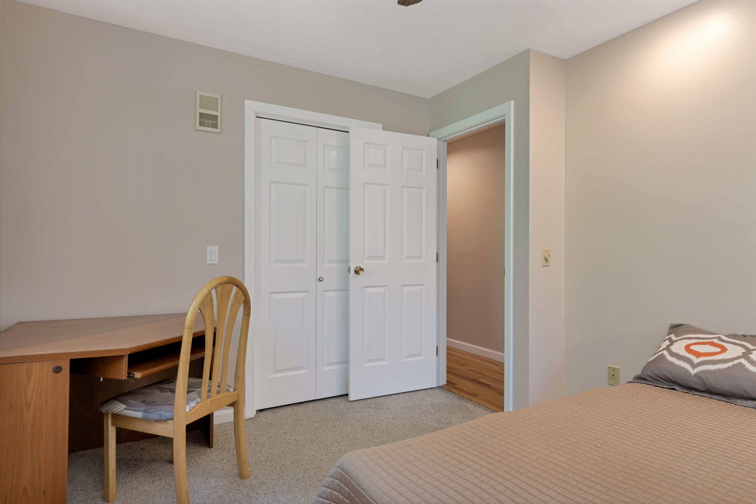 9 Green Pond Road East Falmouth, MA 02536 - Photo 17 of 46 a bedroom with a bed and chair