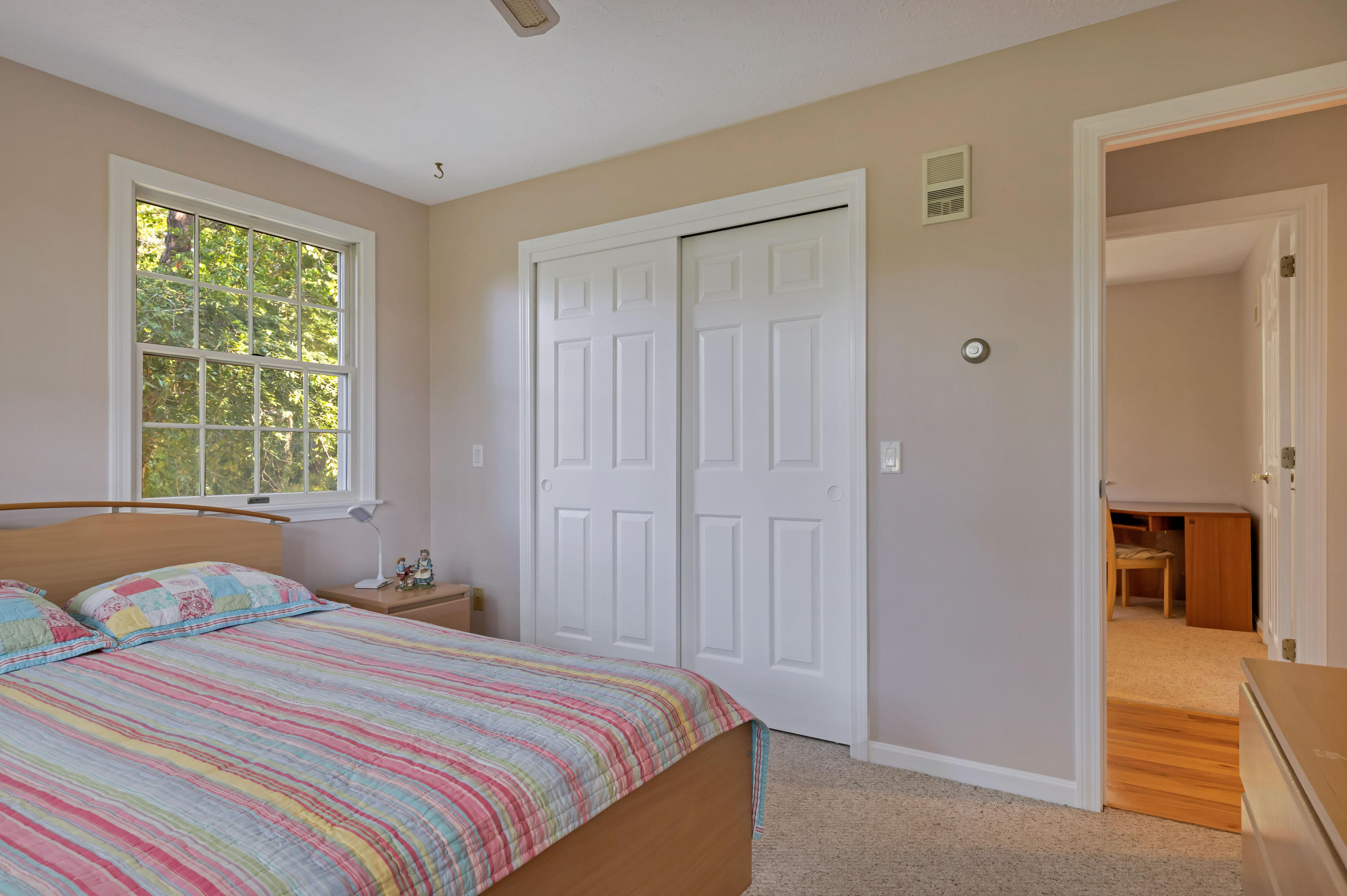 9 Green Pond Road East Falmouth, MA 02536 - Photo 19 of 46 a bedroom with a bed and a window